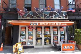 Yes, there are $1 burgers, but you have to buy 3. 123 Burger Shot Beer Restaurant 738 10th Ave New York Ny 10019 Usa