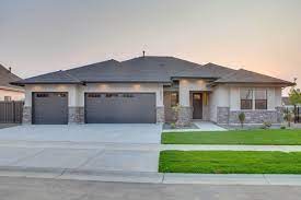 Check spelling or type a new query. Pin By Nancy Martin On Http Www Alturashomes Com Stucco House Colors Bronze Garage Doors Urbane Bronze Garage Door