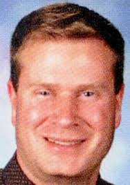 Vigil at Davie High honors popular coach, teacher