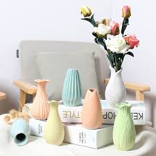 A few curved metallic pieces help to keep the décor. Small Colorful Fresh Ceramic Vases Modern Simple Living Room Home Decor Dry Flower Small Decorative Items Ornament Mini Vase Vases Aliexpress