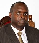 Dr. PAUL KIPYEGON SANG