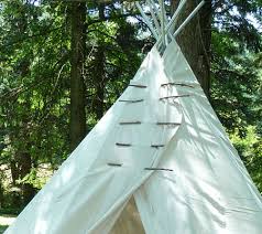 If the ground is too hard, use a rubber mallet or hammer and bang the sticks into the dirt. Diy Backyard Teepee For Kids Ziggity Zoom Family