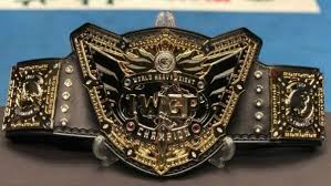 Win any title at the clash of the champions arena Why Do Wwe Fans Dislike The Current Design Of The Wwe World Heavyweight Championship Belt Compared To Past Designs Quora