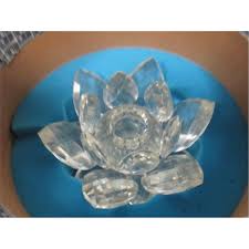 Light beige fabric shades provide an updated elegance, complementing the overall spherical form. Swarovski Crystal Flower Crystal Candle Holder