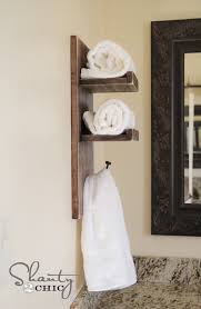 Reclaimed wood and faucet hanger (via apieceofrainbow) got a small bathroom and puzzling over where to hang towels? Super Cute Diy Towel Holder Shanty 2 Chic