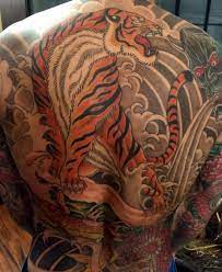 Japanische Tattoos Geschichte Und Bedeutung Japanese Tattoo Traditional Japanese Tattoos Japanese Tiger