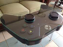 Thanks to furniture maker charles lushear it's now possible to do just that. Xbox One Controller Coffee Table Gamifies Your Living Room Cnet