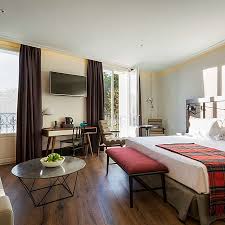 Ofrece habitaciones elegantes con aire acondicionado, conexión wifi gratuita y tv de pantalla plana con canales vía satélite. Hotel Ayre Gran Hotel Colon Madrid Trivago Es