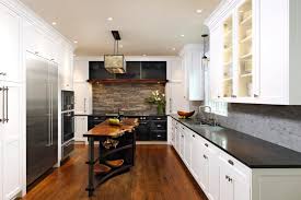 Reclaimed natural materials imaginatively handcrafted for the contemporary kitchen. Rustic Industrial Kitchen Lauren Levant Hgtv