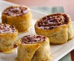 To minimize stretching when moving the dough, roll it around the pin, lift up, and unroll over the buttered pie plate. 7 Recipes That Aren T Pie Using Refrigerated Pie Crust Pinwheel Recipes Dessert Recipes Store Bought Pie Crust