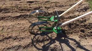 The high arch wheel hoe allows you to cultivate, weed and plow both sides your garden rows in one pass. Hoss High Arch Wheel Hoe Patio Lawn Garden Evertribehq Gardening
