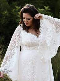 Gorgeous Bohemian Plus Size Wedding Dress With Unique Bell Sleeves And Flowy Lace Skirt From Studio L Modest Wedding Gowns Wedding Dresses Casual Wedding Dress