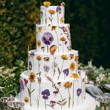 Melissa's edible flowers may include: 10 Creative Ways To Decorate A White Wedding Cake
