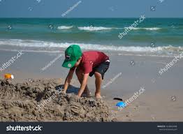 Thailand Hua Hin January 2020 A Little Boy Builds A Sand Castle Playing With Sand And Toys For The Ocean A Holiday With T Stock Photos Sand Castle Hua Hin