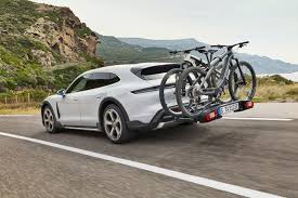 The addition of the performance battery plus, adaptive air suspension with pasm, and the fixed panoramic sunroof makes the cross turismo $1,530 more. Porsche Taycan Cross Turismo Details Pics And Specs Car Magazine