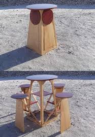 Table And Seats Combines A Round Bar Height Table With Four Fold Out Stools Home Pubs Bars Fold Up Table Table For Small Space Decor