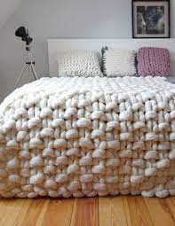 To start knitting, take your right knitting needle and insert it into the first stitch, behind the needle in your left hand. Chunky Knit Throw Chunky Wool Blanket Giant Knit By Panapufa Giant Knit Blanket Knitted Blankets Knitted Throws