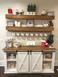 This coffee bar set up, with its curated accents and monochromatic palette, embodies the saying that simplicity is beauty. Home Coffee Bar Designs Coffee Bar Home Kitchen Decor Easy Home Decor