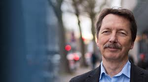 How Do Planetary Systems Develop out of a Disk of Young Stars?