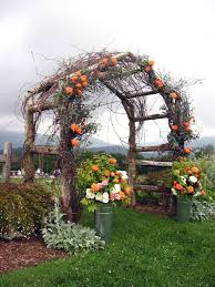 It's perfect for supporting lightweight climbing plants and vines or for displaying small hanging accents to create a beautiful entry into your garden. Garden Arbors And Arches To Give An Entry To Your Garden Setting Country Garden Weddings Rustic Arbor Country Gardening