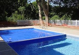 Top 5 Reasons To Get An Automatic Pool Cover Automatic Pool Cover Pool Pool Safety Covers