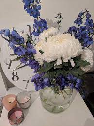 Chrysanthemum And Delphinium Flower Arrangement Flower Arrangements Delphinium Flowers Flowers Photography