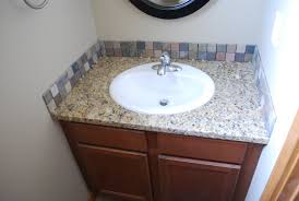 The countertop backsplash in this bathroom is pretty simple. Vanity Backsplash Bathroom Sink Backsplash Ideas Trendecors
