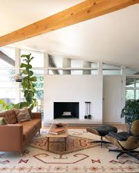 Cantilevered steel frames support wood roof beams with eaves of up to ten feet. 35 Retro Mid Century Modern Living Rooms