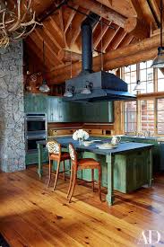 Beautiful Rustic Cabin Kitchen In Green Rustic Cabin Kitchens Log Cabin Kitchens Log Home Kitchens