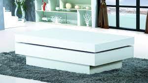 The colour variations make every table unique, and the combination with metal gives it an industrial look. Modern White Gloss Coffee Table Homegenies