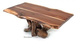 Coaster home furnishings brings in this coffee table that epitomizes the rustic look completely. Rustic Furniture For Every Taste And Style Modern Barn Wood Furniture Natural Wood Coffee Table Reclaimed Wood Coffee Table Walnut Coffee Table