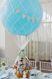 Each guest received custom hot air balloon cookies and cute onesies. Hot Air Balloon Centerpieces For A Baby Boy Shower By Yg Events Babyshower Hot Hot Air Balloon Baby Shower Baby Shower Balloons Hot Air Balloon Centerpieces