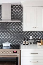 Black And White Kitchen Backsplash Tile Black Arabesque Backsplash Tiles Are A Major Key Feature In This White Kitchen Against Wh Kitchen Remodel Small White Kitchen Remodeling Arabesque Tile Kitchen
