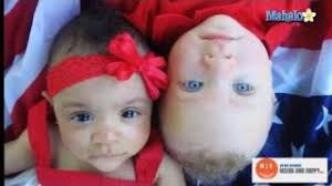 Biracial Couple has Black and White Twins