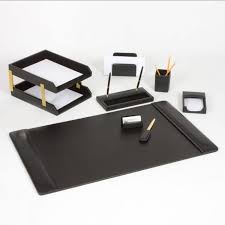 Large round lampshades, spray painted gold on the inside, seem to cast light and shadow oval marks throughout the whole space. Office Accessories Plus Leather Desk Set 10 Piece Black Gold Office Accessories Plus