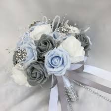 Brides Posy Bouquet With Baby Blue Grey And White Roses With Brooches And Diamantesposy Measure Blue Wedding Flowers Baby Blue Weddings Baby Blue Wedding Theme