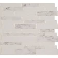 With just a few easy steps, you can transform a backsplash or a wall like this in a few hours! Stick It Tiles Peel And Stick Backsplash White Marble Tile 11 25 Inch X 10 Inch 4 Tile The Home Depot Canada