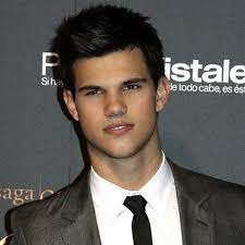The long black hair which he wore in twilight made him look nasty.but in real life, he wears his mens' dark brown hairstyles with waves and spikes. Taylor Lautner I Hated My Long Hair In Twilight Ok Magazine