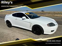 Image result for Sunny Yellow 2004 Tiburon