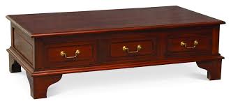A rectangular mahogany coffee table from niagara furniture with all of the bells and whistles including four drawers, reeded legs, solid brass capped feet and cookie shaped, rounded corners. 6 Drawer Coffee Table Mahogany Sapphire Decor