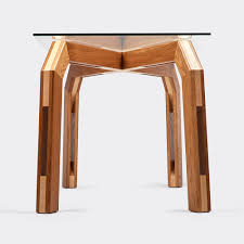 Stylish table of central leg with a differential touch of design. Dinner Table With Glass Top And An Oak And Maple X Frame Charlie Caffyn Furniture