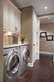 But water and other liquids can affect wood, so how do you protect it in your laundry room. Jacksonville Model Homes Jacksonville Laundry Room Storage Laundry Room Decor Laundry Room Organization