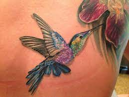 Beautiful Hummingbird Iris Tattoo Done To Remember My Grandmothers Done By Sammy Hayden At Last Angels Tattoo In Dall Iris Tattoo Hummingbird Tattoo Tattoos