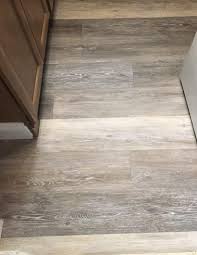 The method that they use for the adhesion is a lapped tongue that is substantial. Trafficmaster Brushed Oak Taupe 6 In W X 36 In L Luxury Vinyl Plank Flooring 24 Sq Ft Case 95311 The Home Depot Vinyl Flooring Kitchen Flooring Vinyl Plank Flooring