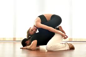 It's good to have a group that is familiar with a variety of yoga poses, or if not, first give a brief demonstration of a couple yoga poses to get them familiarized with different postures. Partner Yoga Om Yoga Casablanca Marrakech Dakhla