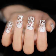 Check out our edit of the best white nails, from acrylics, to gels, natural, to coffin shaped. Cute White Flowers Lace Nail Art Design