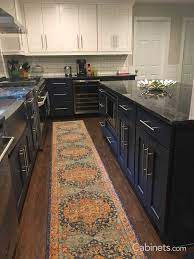 Just the right amount of color. Shaker Maple Bright White Shaker Maple Naval Navy Kitchen White Galley Kitchens Kitchen Remodel