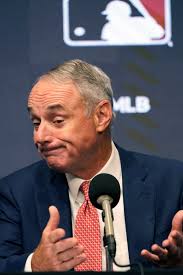 What's next after MLB owners imposed a lockout of players? 'We're here,  they're there. We need to find a way to bridge the gap,' Rob Manfred says. 