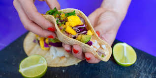 When i think of fish tacos, i picture battered fried fish, cabbage slaw, and a spicy mayo, all wrapped in a corn tortilla. Grilled Fish Tacos Mango Avocado Recipe The Beachbody Blog