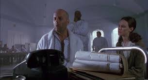 But, he is wanted by the authorities for murder and kidnapping, plus he refuses to return to the future; Twelve Monkeys 1995 Movie Review From Eye For Film